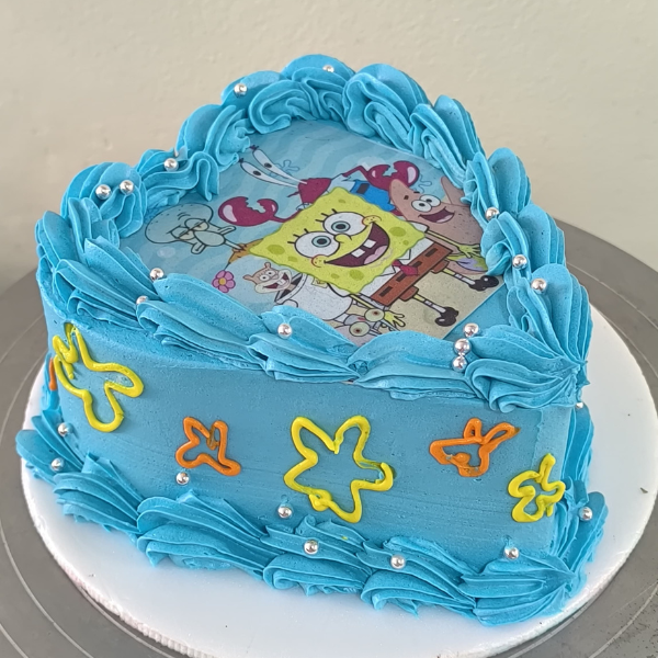 Sabores: Naranja rellena de arequipe. 6 Porciones decorada en buttercream